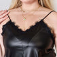 Woman wearing Faux Leather Lace Trim Cami with black lace detailing and thin straps.