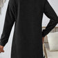 Back view of a Bella Road textured long sleeve mini dress in black, showcasing its basic style and slight stretch.