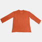 Bella Road V-Neck Long Sleeve Sweater in orange, perfect for fall fashion. Cozy, stylish, and available in seven trendy colors.