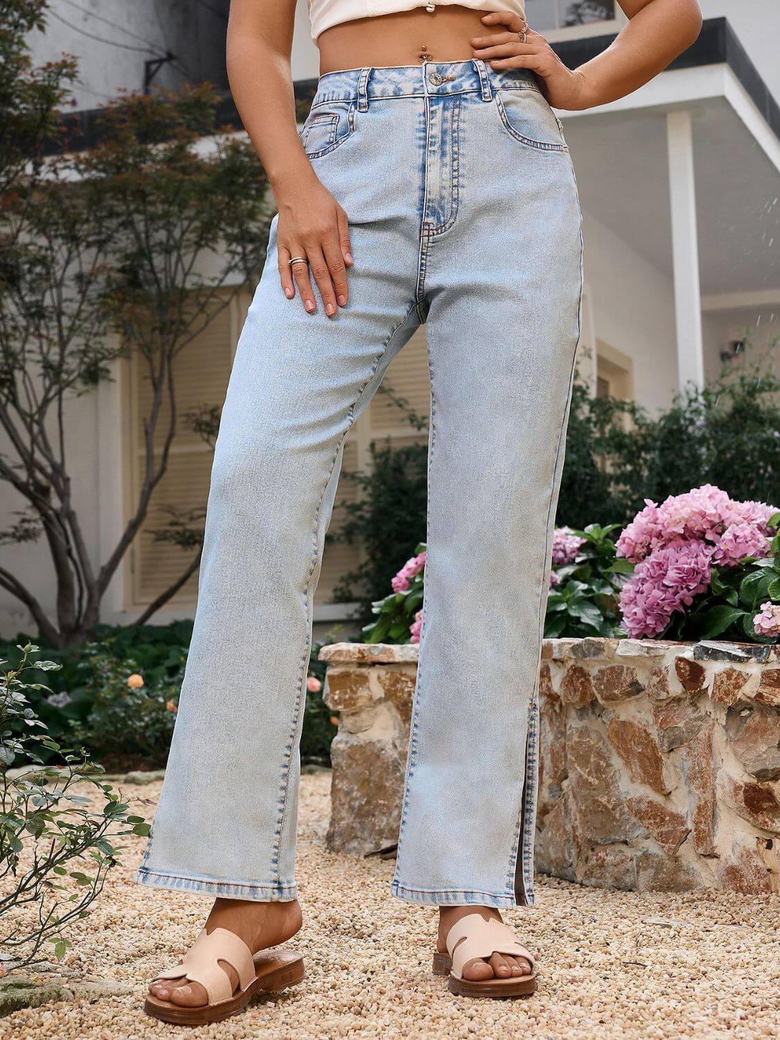 Bella Road side slit straight leg jeans in light wash, styled with pockets, perfect for casual outings.