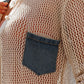 Close-up of Bella Road swim cover-up with openwork design and denim pocket detailing, perfect for summer beach outings.