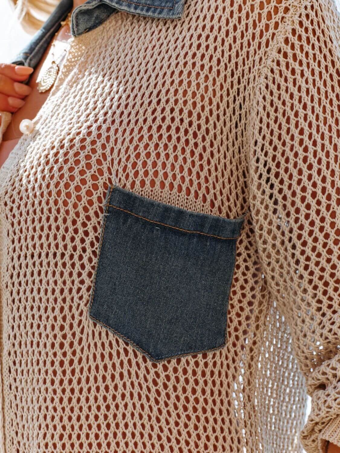 Close-up of Bella Road swim cover-up with openwork design and denim pocket detailing, perfect for summer beach outings.