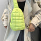 Stylish lemon yellow quilted crossbody bag on woman in chic trench coat, perfect for trendy outfits and everyday adventures.