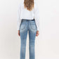 Woman wearing Lovervet Full Size High Rise Slim Straight Jeans, back view showing flattering high-rise fit and slim straight leg style