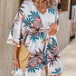 Stylish woman in Bella Road floral tassel tied cover up, perfect for beach days and sunny outings.