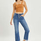 Risen Jeans Button-Fly Cropped Bootcut Jeans with stylish retro button closure, modeled with tan cropped top and black heels.