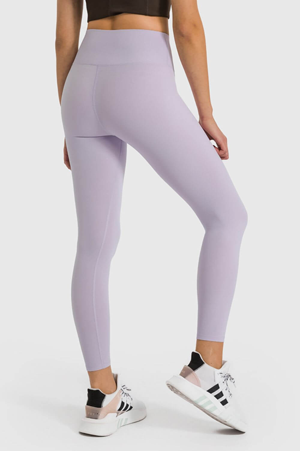 Millennia High Waist Ankle-Length Yoga Leggings in soft lavender, perfect for stylish comfort during workouts.