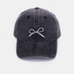 Bow Embroidered Washed Cotton Cap in black with delicate bow design, stylish and comfortable accessory.