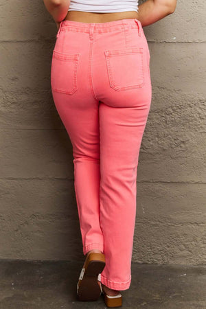 Back view of model wearing Kenya High Waist Side Twill Straight Jeans in pink, showcasing flattering fit and elegant side detailing. Risen Jeans