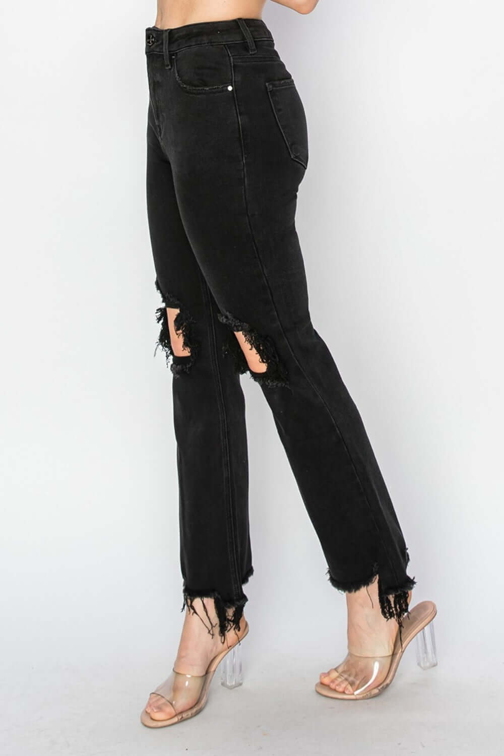 Chic Risen distressed raw hem jeans with pockets, featuring a unique ripped design and original cuff style for everyday or casual wear.