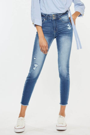 Trendy distressed raw hem high waist jeans with rugged charm and casual vibe, perfect for a bold and stylish outfit.