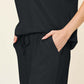 DOUBLE TAKE Full Size Texture Round Neck Short Sleeve T-Shirt and Wide Leg Pants at Bella Road