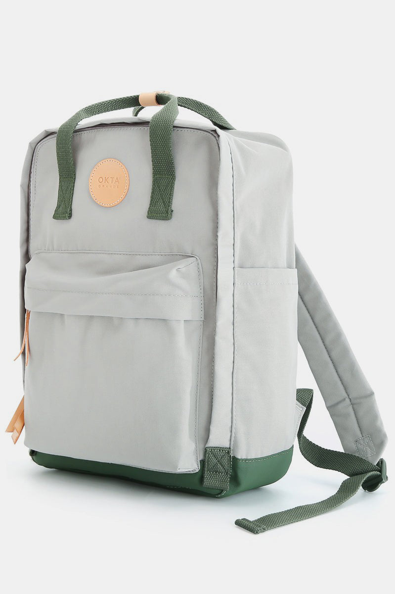 Waterproof canvas backpack with side pockets in light gray and green, perfect for adventures.