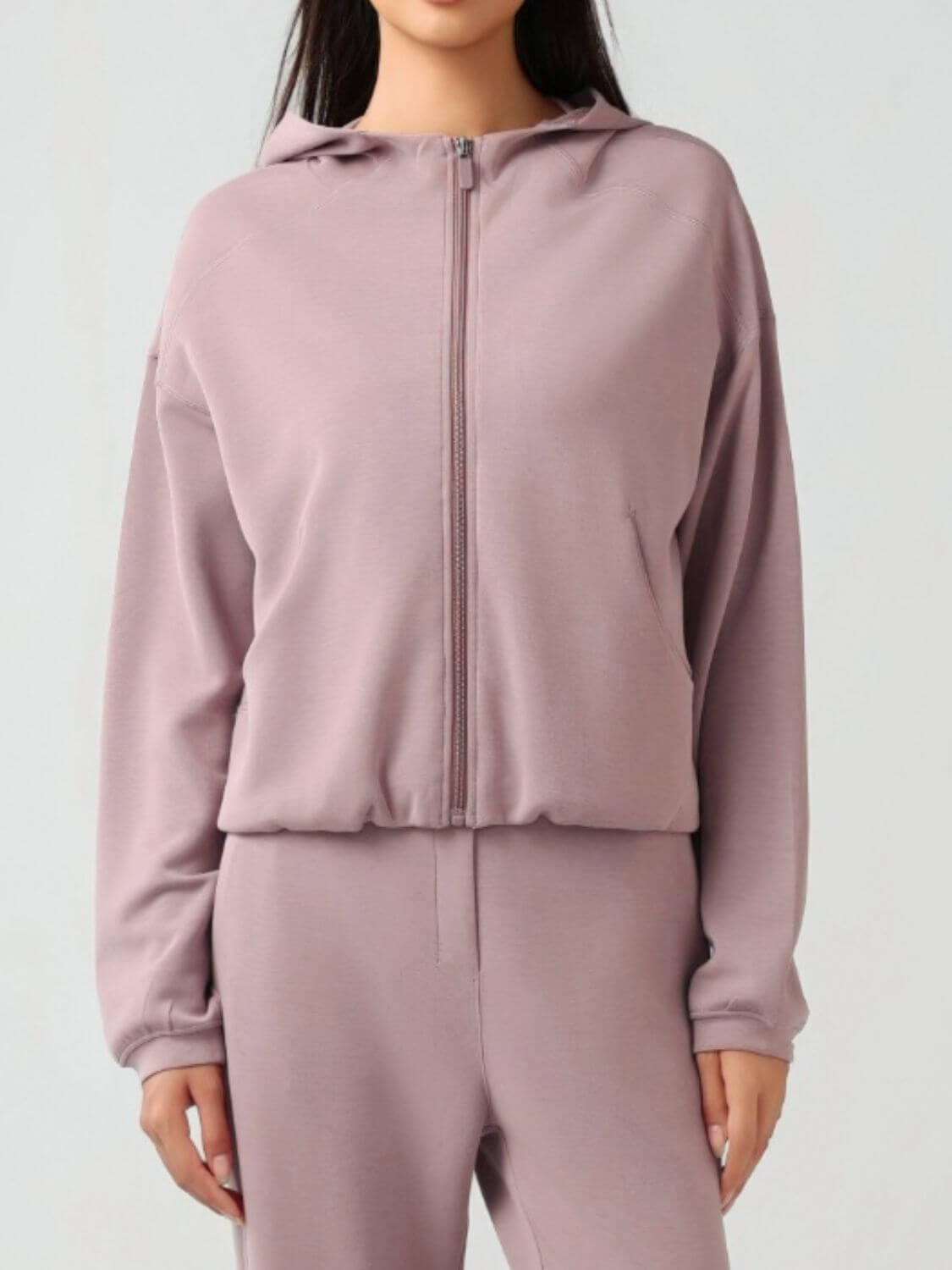 Millennia Zip Up Dropped Shoulder Active Hooded jacket in soft mauve, perfect for stylish workouts and casual wear.