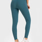 Millennia highly stretchy yoga leggings with wide waistband in teal, showcasing comfort and flexibility. Perfect for workouts!