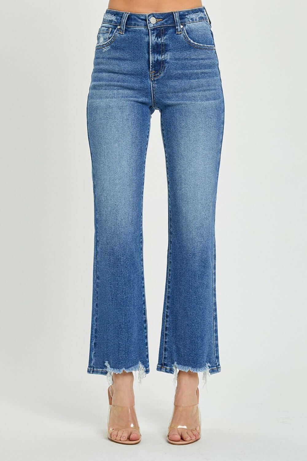 RISEN High Rise Straight Jeans with raw hem and flattering fit shown on a model standing against a white background