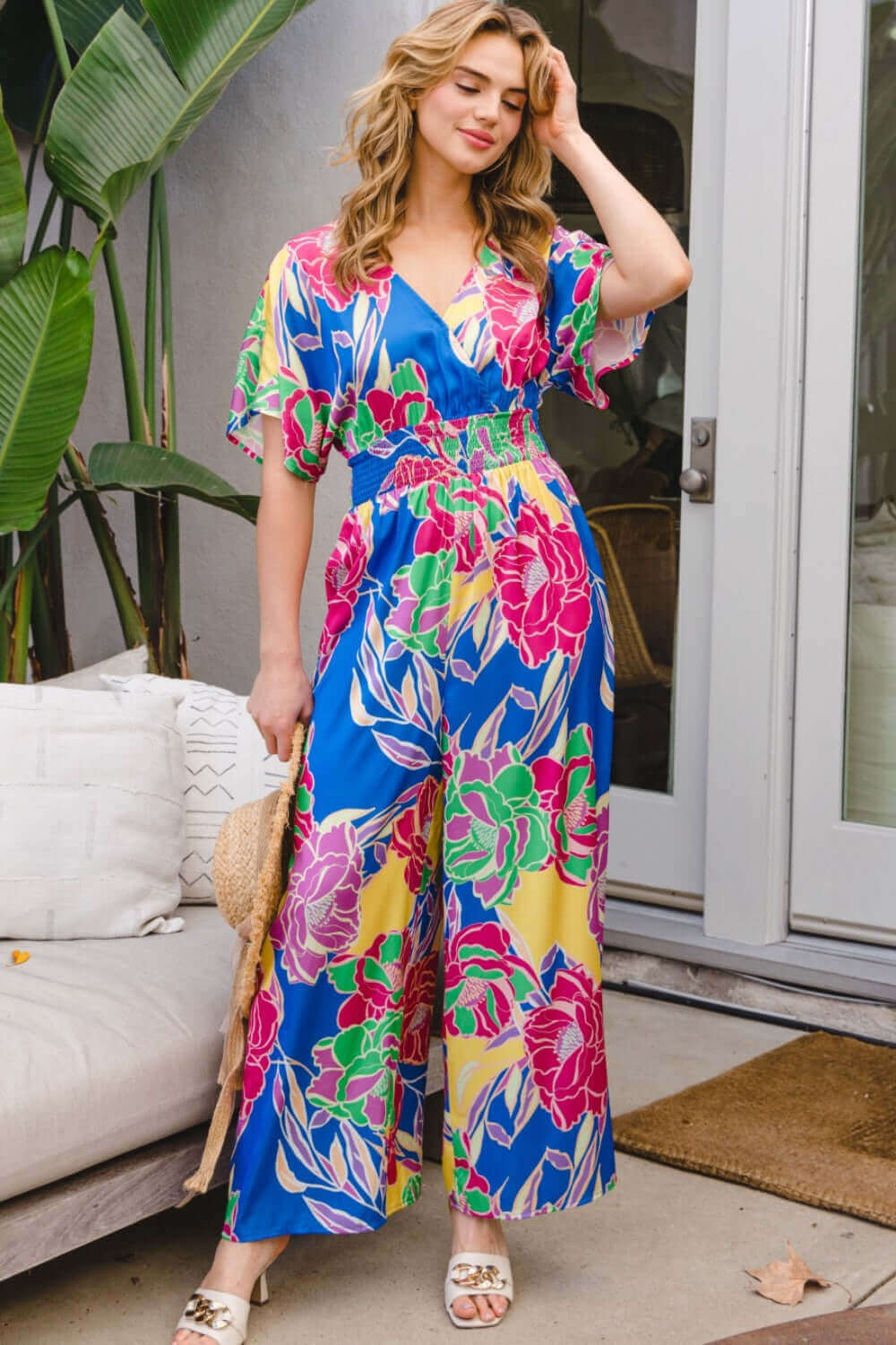 ODDI ODDI Full Size Floral Smocked Tied Back Jumpsuit at Bella Road