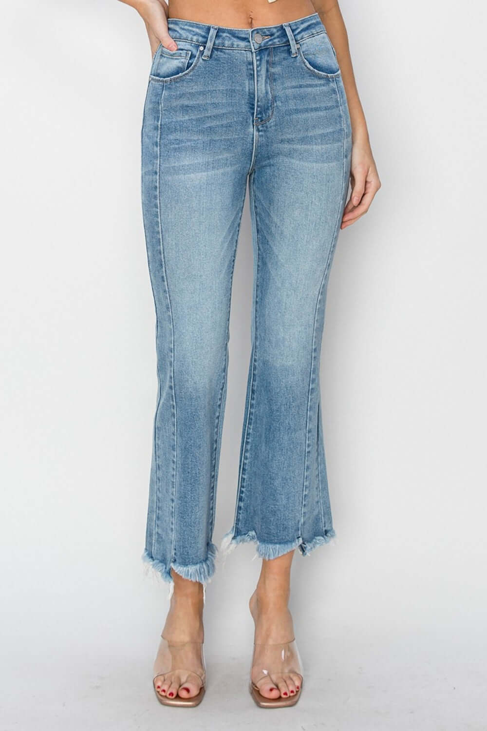 High Rise Frayed Hem Flare Risen Jeans with Bohemian-Inspired Style and Edgy Fray, Perfect for a Casual, Laid-Back Look.