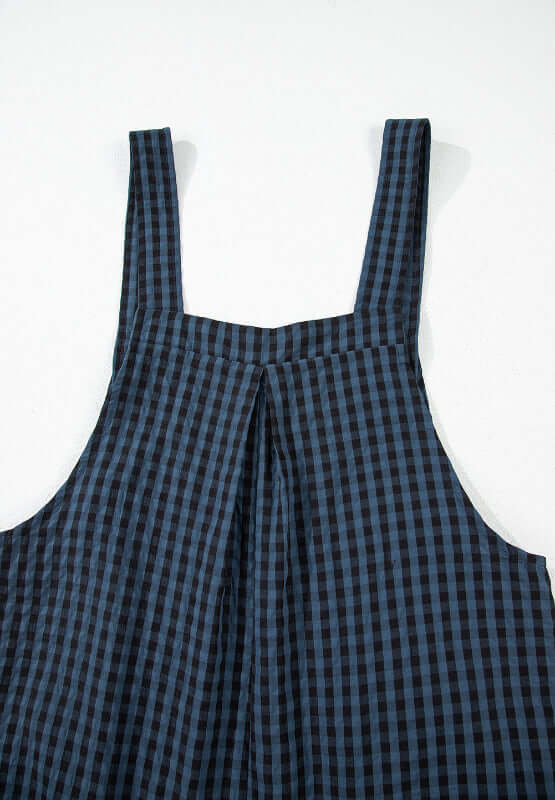 Stylish close-up of Bella Road Plaid Wide Strap Overalls in black and blue plaid, perfect for a trendy and comfy outfit.