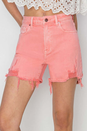 Risen Jeans High Rise Distressed Denim Shorts in coral, with frayed hem and flattering fit. Perfect for versatile, stylish looks.