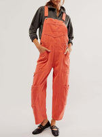 Stylish orange Bella Road Pocketed Wide Strap Denim Overalls, perfect for any adventure. Fashionable and functional with no stretch.