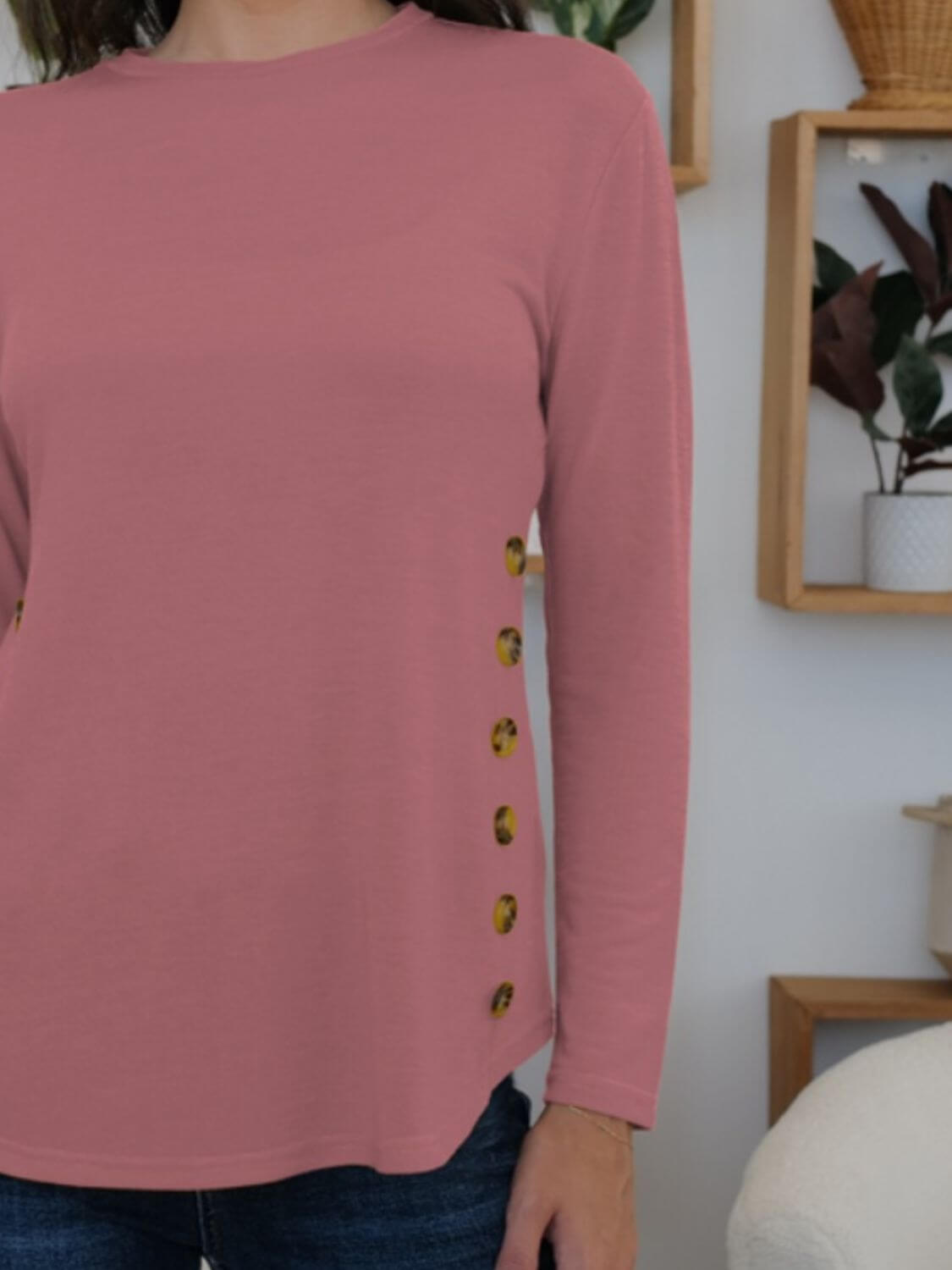 Dusty pink round neck long sleeve t-shirt with decorative buttons from FAM-FAM collection, perfect for casual occasions.