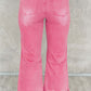 Distressed raw hem pink jeans with pockets in 100% cotton for a trendy casual look