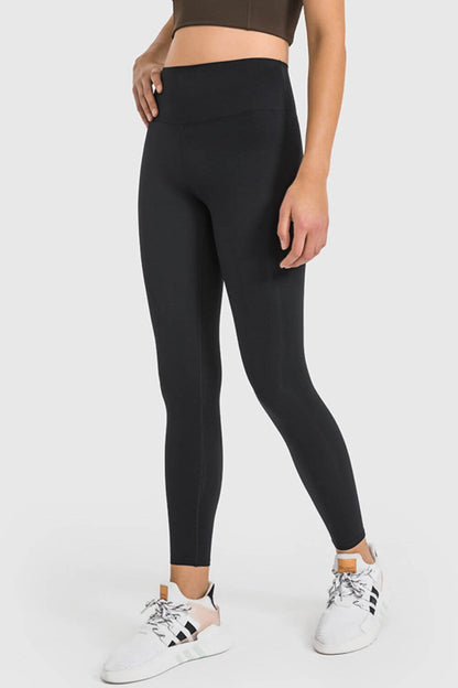 Black Millennia High Waist Ankle-Length Yoga Leggings, perfect for stylish workouts and yoga sessions.