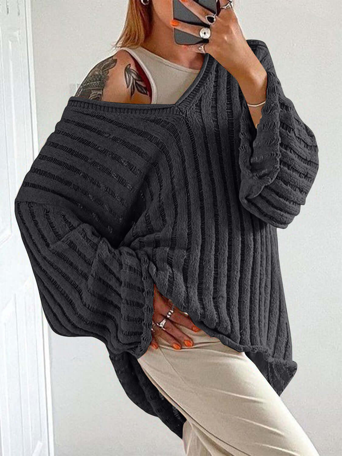 Cozy Bella Road V-Neck Long Sleeve Sweater in charcoal gray, perfect for chic fall fashion with a comfy, slightly stretchy design.