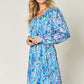 DOUBLE TAKE Full Size Printed Drawstring Waist Long Sleeve Dress at Bella Road