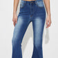 Woman wearing mid-rise waist bootcut jeans with pocket and button details, no stretch, 85% cotton and 15% polyester blend.