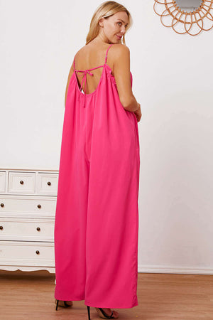 DOUBLE TAKE Full Size Ruffle Trim Tie Back Cami Jumpsuit with Pockets at Bella Road