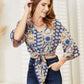 DOUBLE TAKE Tie Hem V-Neck Three-Quarter Sleeve Blouse at Bella Road