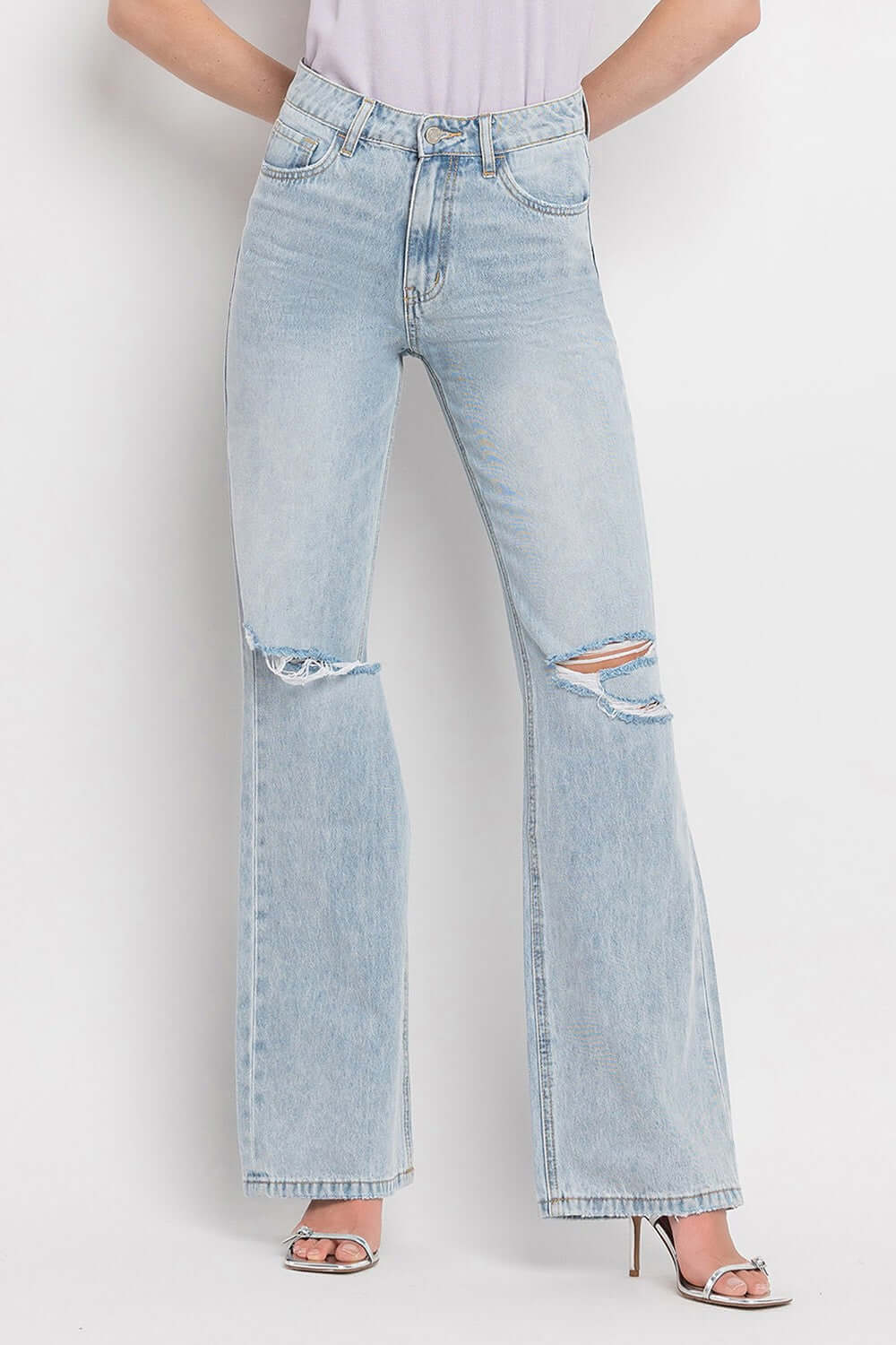 90's Vintage Super High Rise Flare Jeans with distressed details and wide flare legs, offering a retro-inspired and stylish silhouette