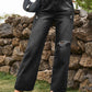 Black Bella Road Distressed Jeans with stylish pockets, slightly stretchy fit, and fashionable distressing, perfect for any occasion.