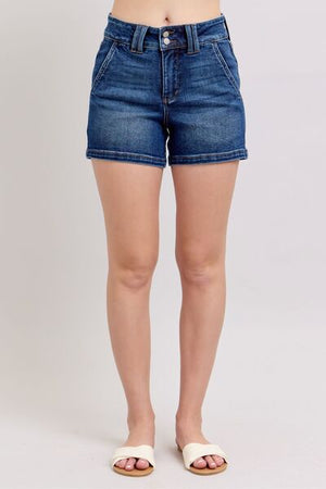 Judy Blue plus size double button waistband denim shorts in stylish dark blue wash, showcasing a flattering high-waisted fit.