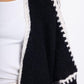 Close-up of Double Take Contrast Open Front Cardigan showcasing black and white pattern and dropped shoulder design.