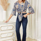 DOUBLE TAKE Tie Hem V-Neck Three-Quarter Sleeve Blouse at Bella Road