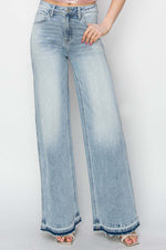 Elegant high rise wide leg jeans by Risen Jeans, featuring a retro flair. Perfect for making a stylish statement in any outfit.