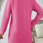 Back view of Bella Road pink textured long sleeve mini dress, showcasing its stylish design and comfortable fit.