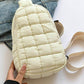 Chic Bella Road quilted nylon crossbody bag in cream, perfect for trendy adventures.