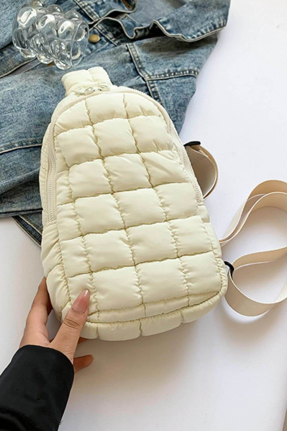 Chic Bella Road quilted nylon crossbody bag in cream, perfect for trendy adventures.