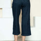 Back view of Judy Blue crop wide leg jeans with side seam braid detail, showcasing the unique design and relaxed fit.