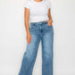 Model wearing bytos high rise wide leg jeans with pockets, showcasing a stylish and comfortable denim look.