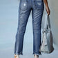 Stylish Bella Road Distressed Raw Hem Jeans with Pockets, adding edgy flair to any outfit. Fashion-forward denim must-have!