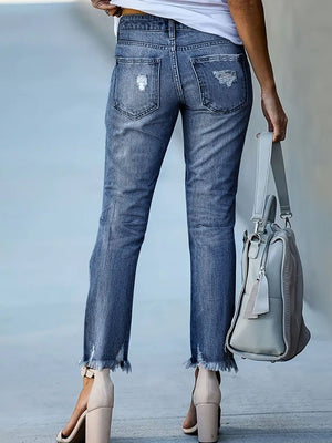 Stylish Bella Road Distressed Raw Hem Jeans with Pockets, adding edgy flair to any outfit. Fashion-forward denim must-have!