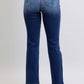 Back view of Judy Blue washed straight leg jeans with pockets, showcasing a flattering fit and stylish design.