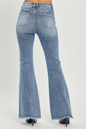 Back view of RISEN Full Size High Waist Raw Hem Flare Jeans in blue denim with raw hem details.