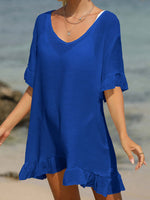 Blue tied ruffled sheer half sleeve cover-up, featuring 65% cotton and 35% polyester, perfect for beach wear. Machine wash cold, tumble dry low.