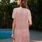 Stylish woman in pink openwork cover-up by the pool, perfect for summer beach days and casual outings.